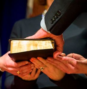 Hand on Bible